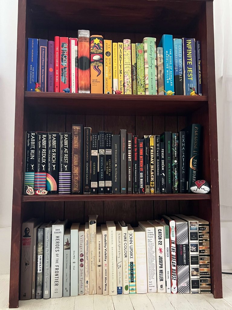 colorful shelf of Cassandre's favorite books